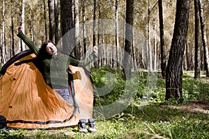 Young montaineer waking up