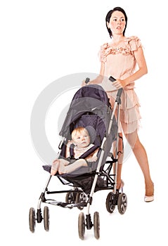 Young mother with baby in perambulator