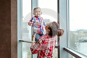 Young mother holding her child