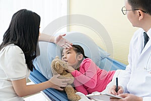 Young mother and little daughter meet doctor medical Consultation at clinic