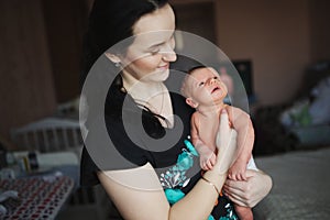 Young mother with newborn baby
