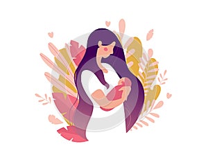 Young mother with a newborn baby in her arms. Woman with a baby on a background of nature and leaves. The concept of motherhood,