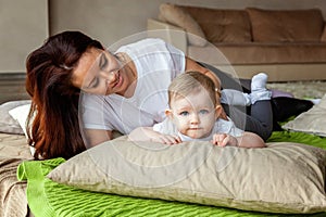 Young mother playing with her child