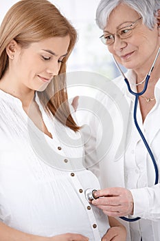 Young mother at pregnancy consultation