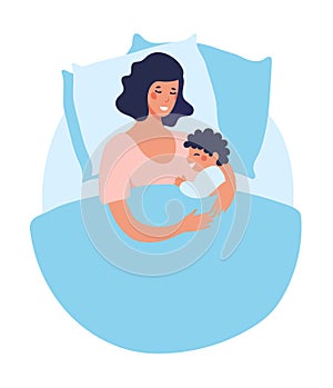 A young mother sleeps with a newborn baby. Joint sleep with a baby. The woman sleeps, smiles and hugs the baby. Flat