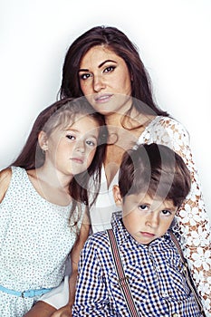 young mother with two children on white background isolated, happy smiling family, lifestyle people concept