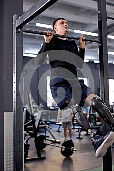 young motivated man building upper body strength