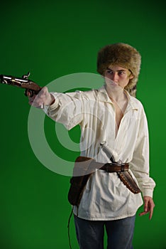 Young mountain man with cap and ball pistol and knife