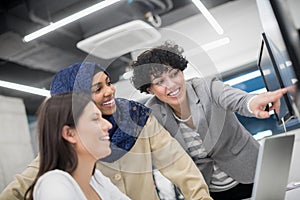 Multiethnics team of software developers working together