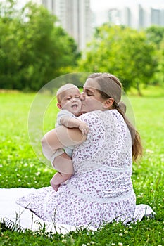 Young mum walks with the child