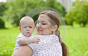 Young mum walks with the child