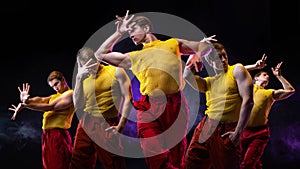 a young muscular man in a bright outfit poses in a pretentious pose,collage of several poses. photo