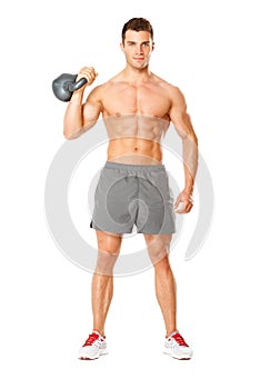 Young muscular man lifting weights on white