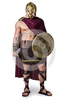 Young muscular man posing in gladiator costume photo