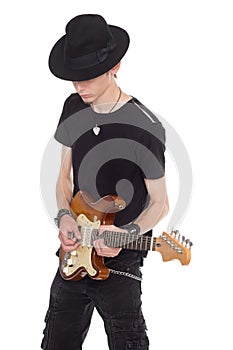 Young musician with electric guitar