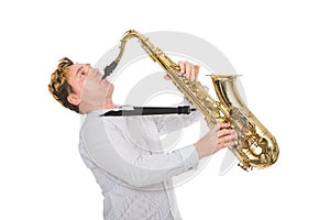 Young musician plays the saxophone