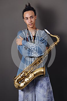 Young musician with saxophone