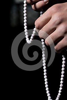 Young Muslim Man With Rosary Praying