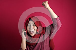 Young Muslim Woman Get Good News on Her Phone