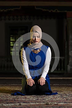 Young Muslim Woman Praying