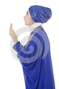 Young muslim woman praying 1