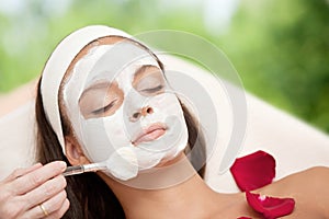 Young Natural Relaxing Beauty Having Moistening Mask Applied