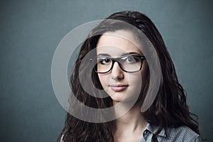 Young nerd woman with glasses