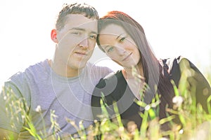 Young newleywed couple in bright sun