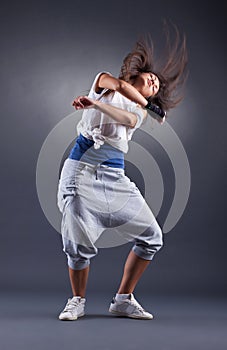 Young nice girl dancing