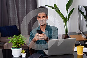 Young Nomad Travel at Teleworking Desk With Laptop