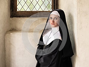 Young nun in abbey