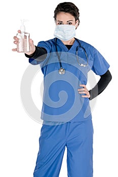 Young nurse, blue scrubs, mask, hand sanitizer