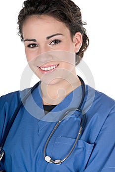 Young nurse, blue scrubs and stethoscope, isolated