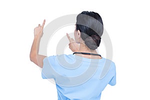Young nurse in blue tunic gesturing with hands