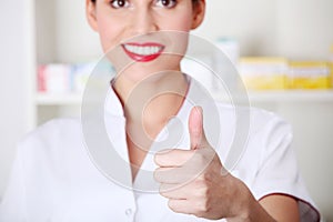 Young nurse, doctor showing ok gesture.