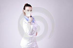 Young nurse gesture silence please