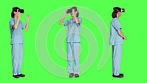 Young nurse uses virtual reality headset