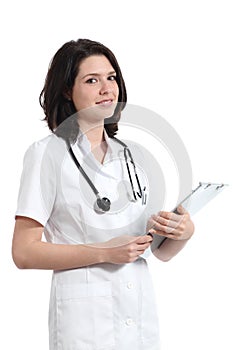 Young nurse woman posing and holding a medical history