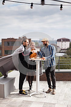 Young office team relax, coffee break. Casual clothing. Tea time