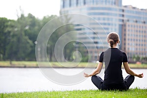 Young office woman sitting in yoga pose