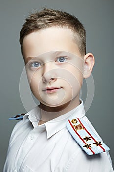 Young officer. handsom boy weared in uniform. Police child