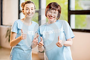 Young and older volunteers indoors