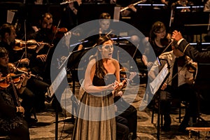 Young opera singer performing aria at National Theater in Belgrade