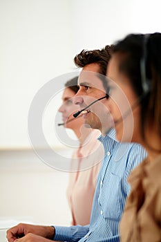 Young operator team working with microphone