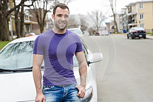 Young owner man with his car