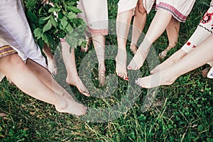 Young pagan Slavic girl conduct ceremony on Midsummer.