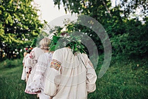 Young pagan Slavic girl conduct ceremony on Midsummer