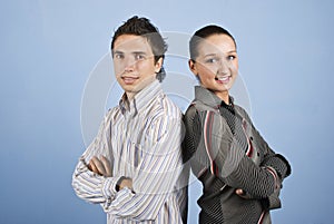 Young pair of business people smiling