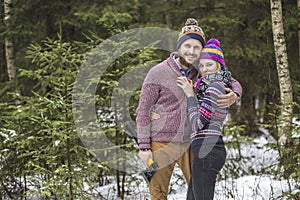 Young pair searching a christmas tree