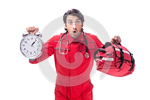 The young paramedic in red uniform isolated on white